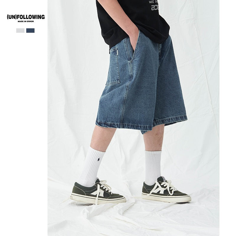 Simple loose mid-rise light blue cotton denim shorts for men