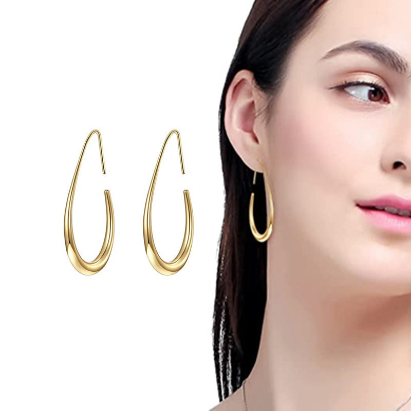 Large oval pull-through earrings with high polishing and personalized jewelry