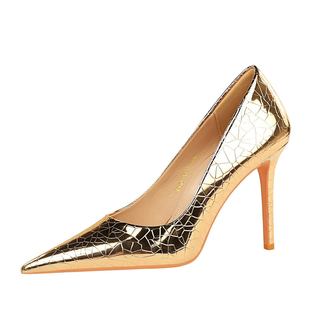 Stiletto ultra high heeled shallow mouth pointed metal wind single shoes