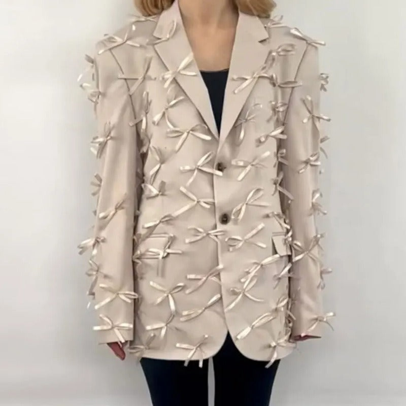 Chaqueta de traje pequeña con diseño de empalme de lazo tridimensional de manga larga con cuello en V para mujer